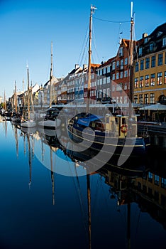 Nyhavn pier with color buildings and boats reflected in water, Copenhagen, Denmark ÃâÃÂ 